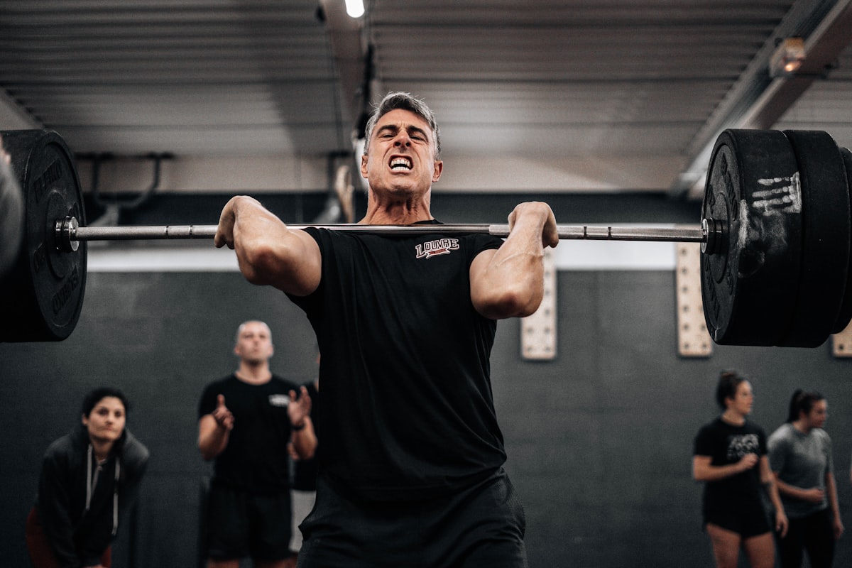 Mature man performing strength training exercise